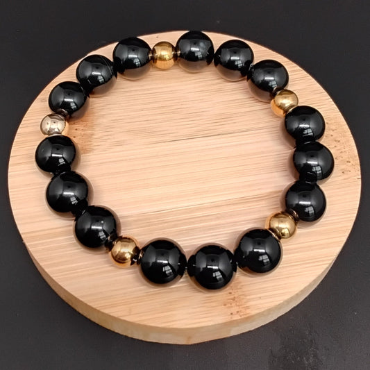 Black Onyx w/gold stainless steel spacers